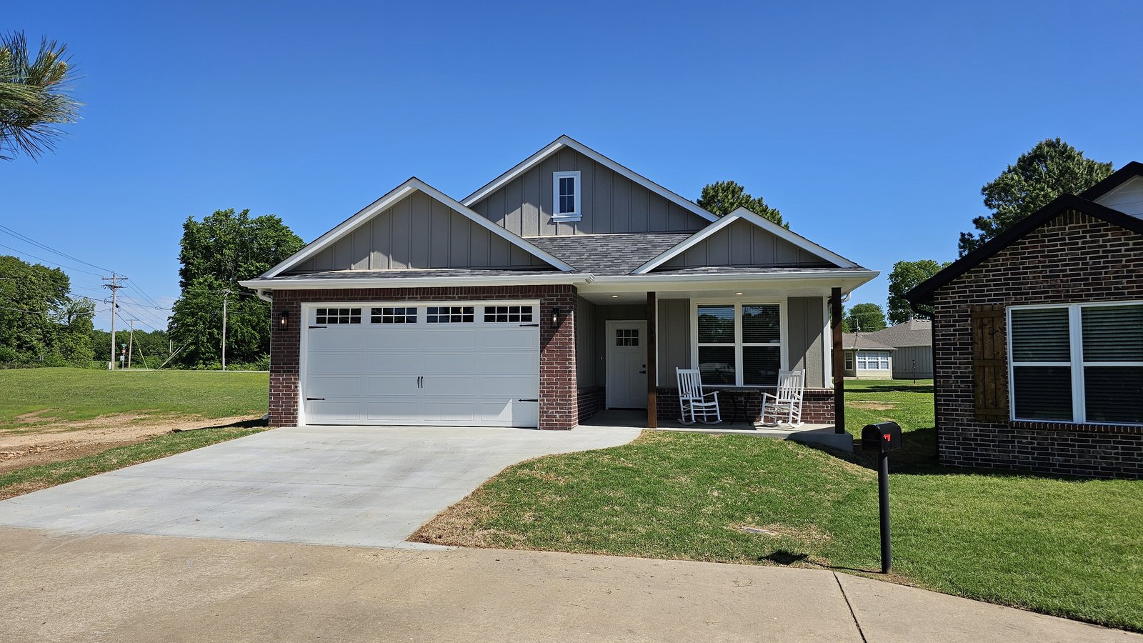 Daytime exterior of custom brick home
