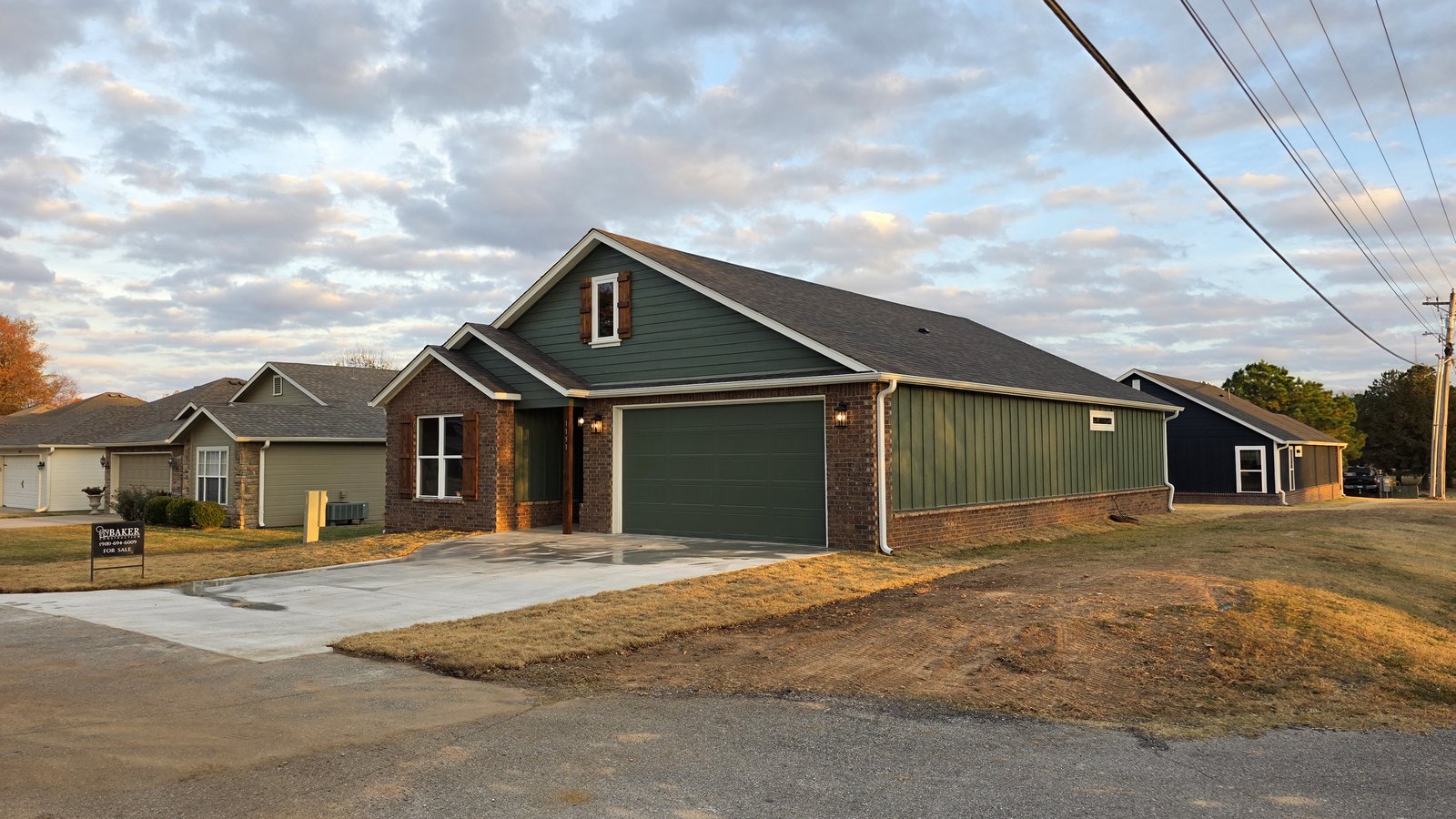 Side elevation of custom home on open lot